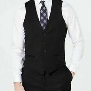 Ryan Seacrest black vest